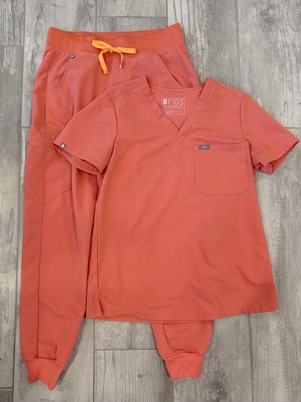 FIGS Women's Scrub Set in Coral Pink with Orange Drawstring - Small Top/Bottom